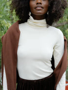 DONNI. The Baby Rib Turtleneck - Powder